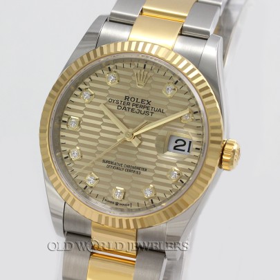 Rolex Datejust 36 Ref 126233 18K Gold Steel Champagne Diamond Motif Dial